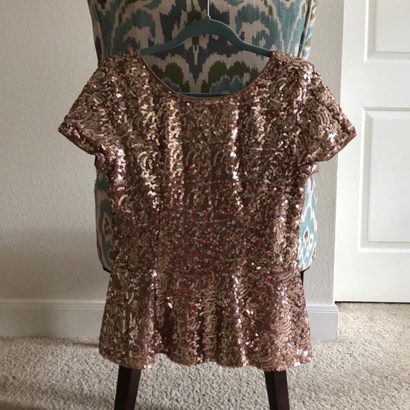 Tops - Rose gold sequin peplum top with back zipper.
